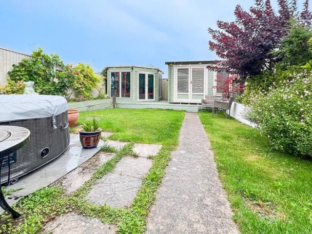 The garden has a lot of room and is perfect for hosting summer gatherings.