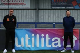 New signing Alex Wall, left, and Hawks boss Paul Doswell. Picture: Kieron Louloudis