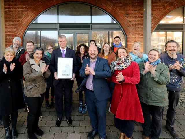 Cllr Sean Woodward of the Partnership for South Hampshire (centre) presents the People's Choice Award of the Solent Quality Space Awards to architect Deniz Beck (centre left), Cllr Steve Pitt (centre right), artists and well-wishers at the Hotwalls, Old Portsmouth, in 2020.
Picture: Chris Moorhouse     (150120-23)