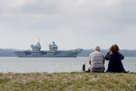 Aircraft carrier HMS Prince of Wales sits off the coast of Gosport, Hampshire, after it suffered a propeller shaft malfunction. Photo:  Gareth Fuller/PA Wire