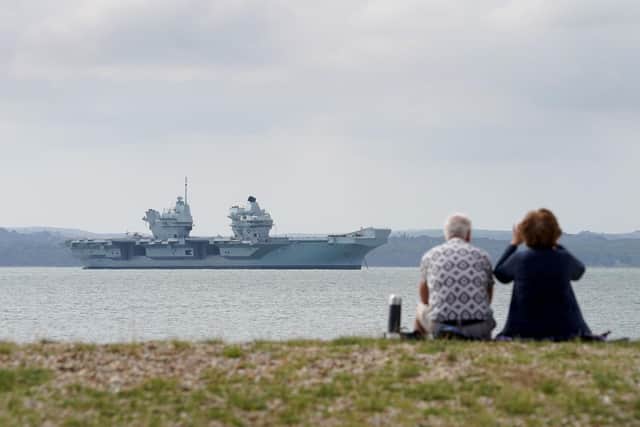Aircraft carrier HMS Prince of Wales sits off the coast of Gosport, Hampshire, after it suffered a propeller shaft malfunction. Photo:  Gareth Fuller/PA Wire