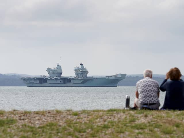 Aircraft carrier HMS Prince of Wales sits off the coast of Gosport, Hampshire, after it suffered a propeller shaft malfunction. Photo:  Gareth Fuller/PA Wire