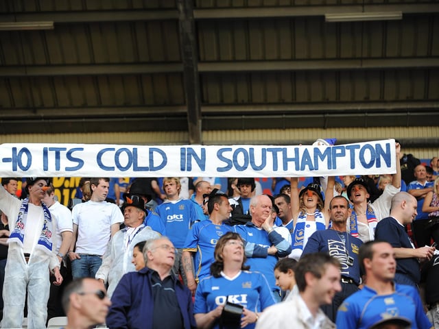 Pompey fans hold up a message to Southampton fans in 2007