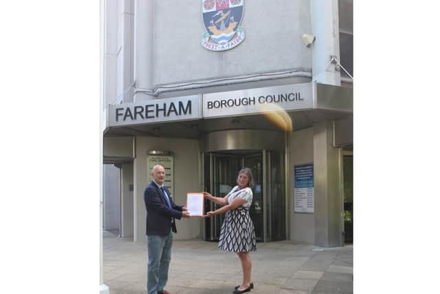 Tony Goodridge from the Save Our Strategic Gaps Facebook group and Zoe Aspinall from the Green Party arrive at Fareham Borough Council to hand in the petition. Picture: Tony Goodridge.