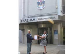 Tony Goodridge from the Save Our Strategic Gaps Facebook group and Zoe Aspinall from the Green Party arrive at Fareham Borough Council to hand in the petition. Picture: Tony Goodridge.