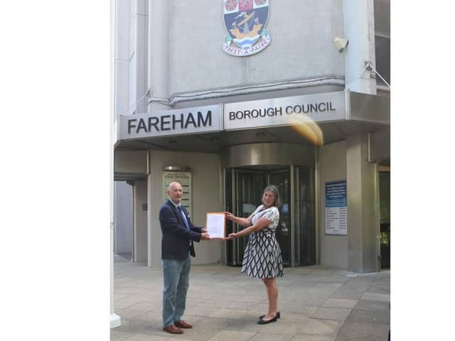 Tony Goodridge from the Save Our Strategic Gaps Facebook group and Zoe Aspinall from the Green Party arrive at Fareham Borough Council to hand in the petition. Picture: Tony Goodridge.