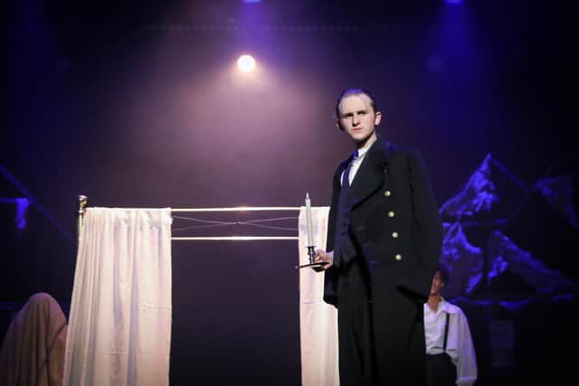 Edward Bailey takes the lead role as skinflint Scrooge in Portsmouth Grammar School's production of A Christmas Carol at the New Theatre Royal. Picture: Portsmouth Grammar School