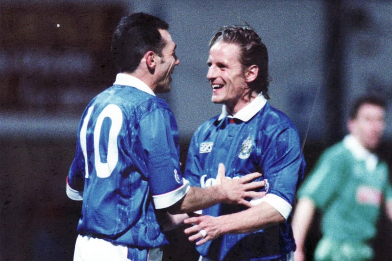 Guy Whittingham celebrates scoring with strike partner Paul Walsh during a Division One match in 1993. Arguably the best of the Goodman era shirts.