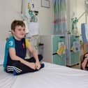Pictured - Teddy Smith, 9 from Drayton was surprised by the 'King' when he arrived at the ward.
Photos by Alex Shute