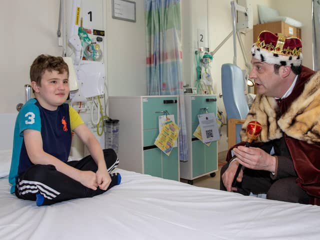 Pictured - Teddy Smith, 9 from Drayton was surprised by the 'King' when he arrived at the ward.
Photos by Alex Shute