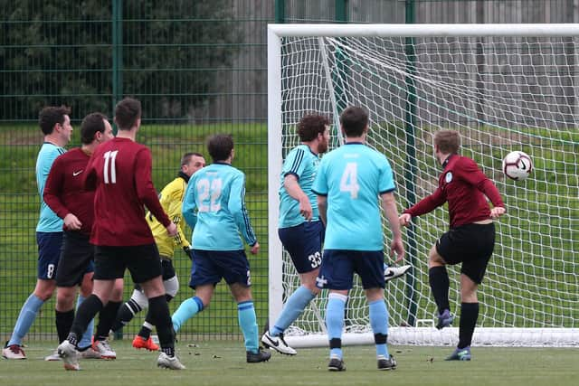 Harvey Herringshaw, right, scores Burrfields' first goal in their 3-3 draw with Portchester Rovers. Picture: Chris Moorhouse