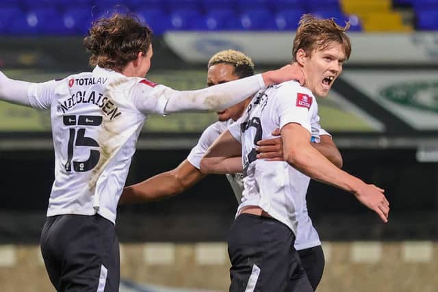 Goal 2-3 Portsmouth defender Sean Raggett (20) pushes home and celebrates during the The FA Cup match between Ipswich Town and Portsmouth at Portman Road, Ipswich, England on 7 November 2020.