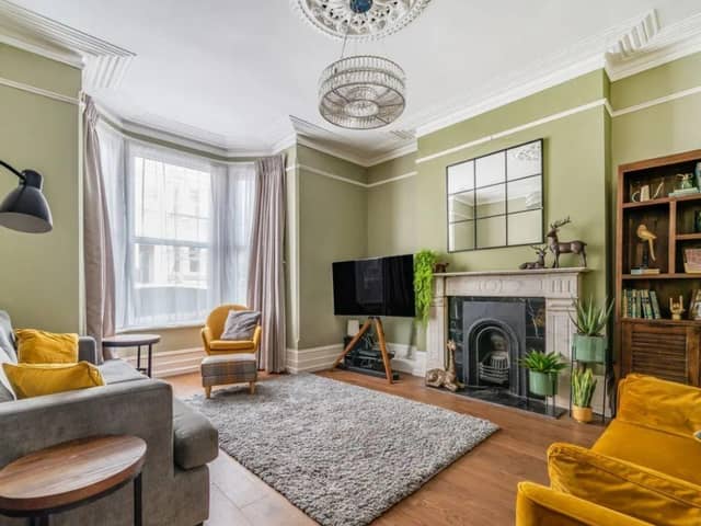 This property comes with six bedrooms, five bathrooms and four reception rooms.