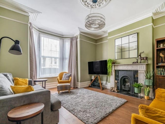 This property comes with six bedrooms, five bathrooms and four reception rooms.