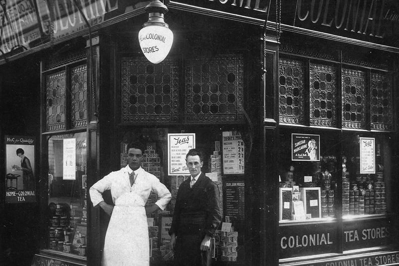 Home and Colonial store in Kingston Road, Portsmouth.
Standing smartly outside the Home and Colonial store is Albert Brendell in white apron. Picture: Janet White.