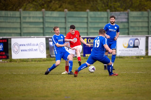 Action from Gosport Town's 4-0 victory over Lee Rangers (blue kit) in the Portsmouth & District FA Trophy final at Cams Alders. Picture: Alex Shute