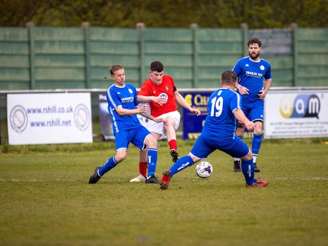 Action from Gosport Town's 4-0 victory over Lee Rangers (blue kit) in the Portsmouth & District FA Trophy final at Cams Alders. Picture: Alex Shute