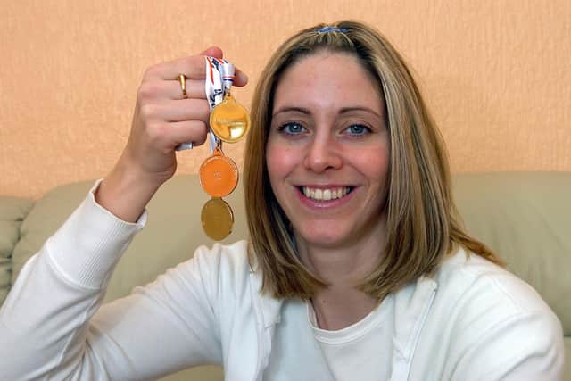 More medals - Katy Sexton with her two gold and one bronze won at the British Swimming Championships in 2007. Picture: MICHAEL SCADDAN