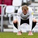 Jack Whatmough is dejected at the final whistle after Pompey's 4-1 defeat at Northampton on Saturday. Picture: Dennis Goodwin/ProSportsImages