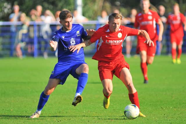 Baffins (blue) and Horndean are two of the top four sides in the Wessex Premier League table. Picture: Martyn White.
