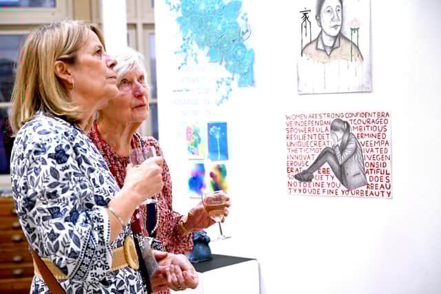 Portsmouth High School alumnae enjoy the exhibition