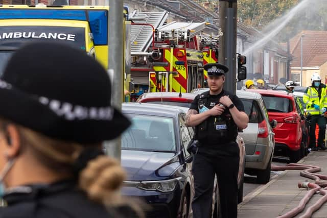 Paramedics attending to a casualty from the explosion. Picture: Mike Cooter (221021)