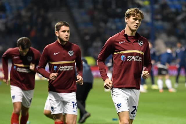 Pompey defender Sean Raggett, right.