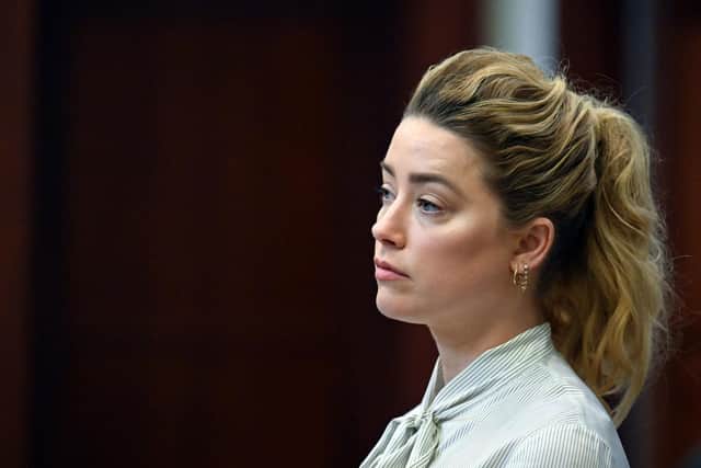 Actress Amber Heard appears in the courtroom during a hearing at the Fairfax County Circuit Court in Fairfax, Virginia.