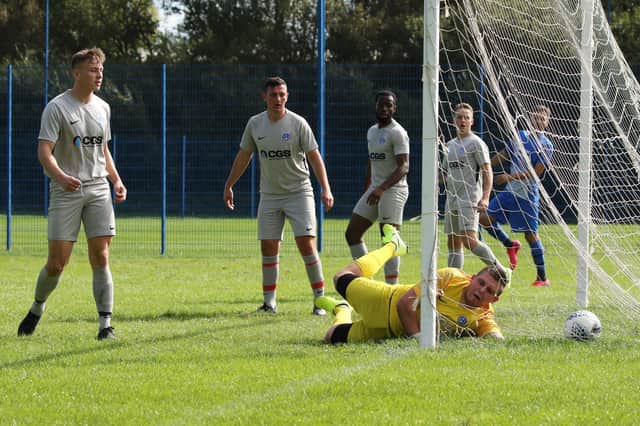 The Port South keeper can't keep the ball out as Milton Rovers score in their Portsmouth Sunday League game. Milton won 4-2. Picture: Kevin Shipp.