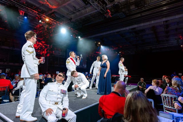 HMS Prince of Wales played host to The Sky’s the Limit Ball, a fundraising event for the Royal Navy and Royal Marines Charity (RNRMC). Picture: Royal Marines Band Service