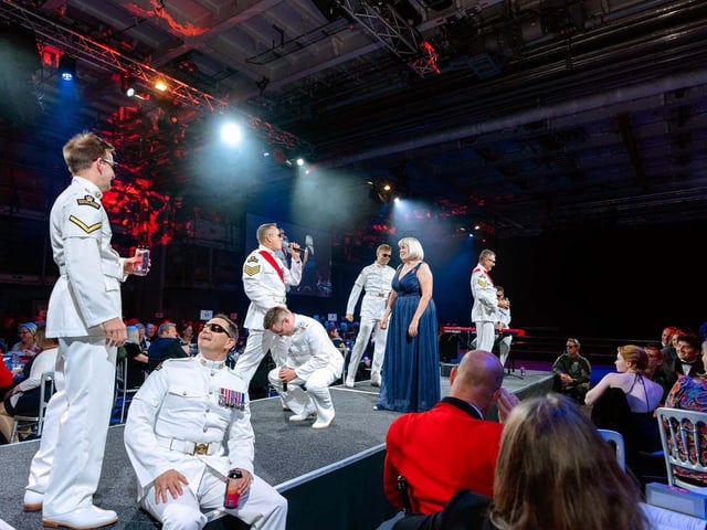 HMS Prince of Wales played host to The Sky’s the Limit Ball, a fundraising event for the Royal Navy and Royal Marines Charity (RNRMC). Picture: Royal Marines Band Service