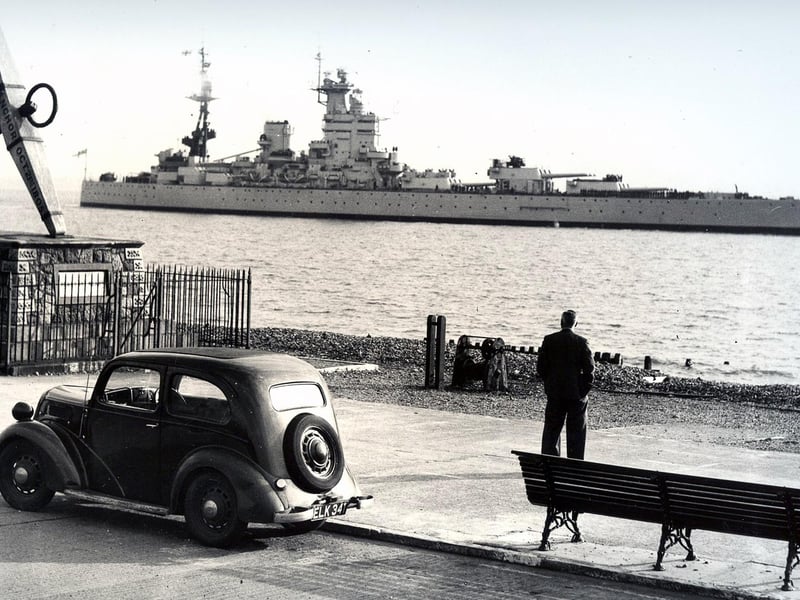 Clarence Esplanade, with only a single man as an audience for the battleship HMS Nelson. Taken by a News photographer in the 1930's.