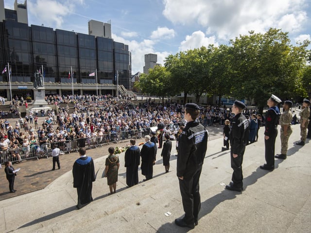 Crowds gather at Guildhall Square.