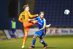 Connor Ogilvie goes up against Ronan Curtis when the sides met at the Priestfield Stadium in October 2020. Picture: Nigel Keene/ProSportsImages