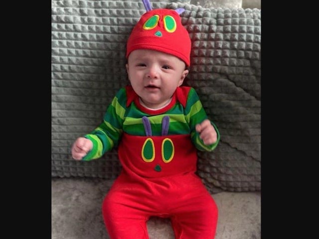 Three-month-old Tayo as the Very Hungry Caterpillar