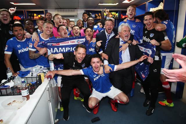 Pompey's squad celebrate the League Two title following a 6-1 win over Cheltenham in May 2017. Picture: Joe Pepler/Digital South.
