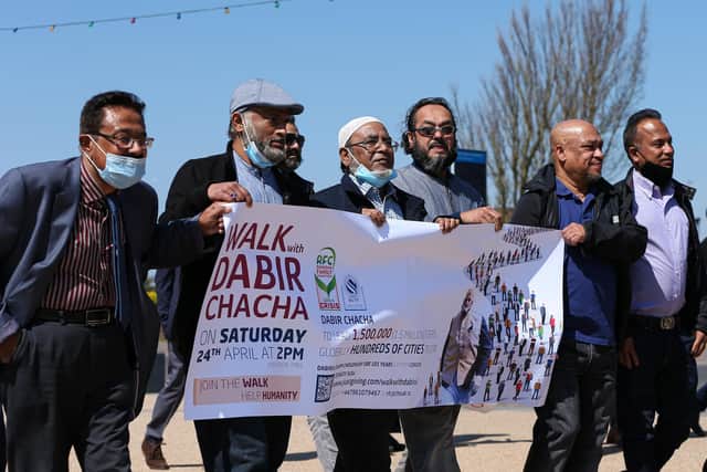 Walkers for Dabirul Islam Choudhury raising funds for victims of Covid-19 in the UK, Bangladesh, Pakistan and 45 more countries, pictured at the D-Day Museum, SouthseaPicture: Chris Moorhouse (jpns 240421-24)