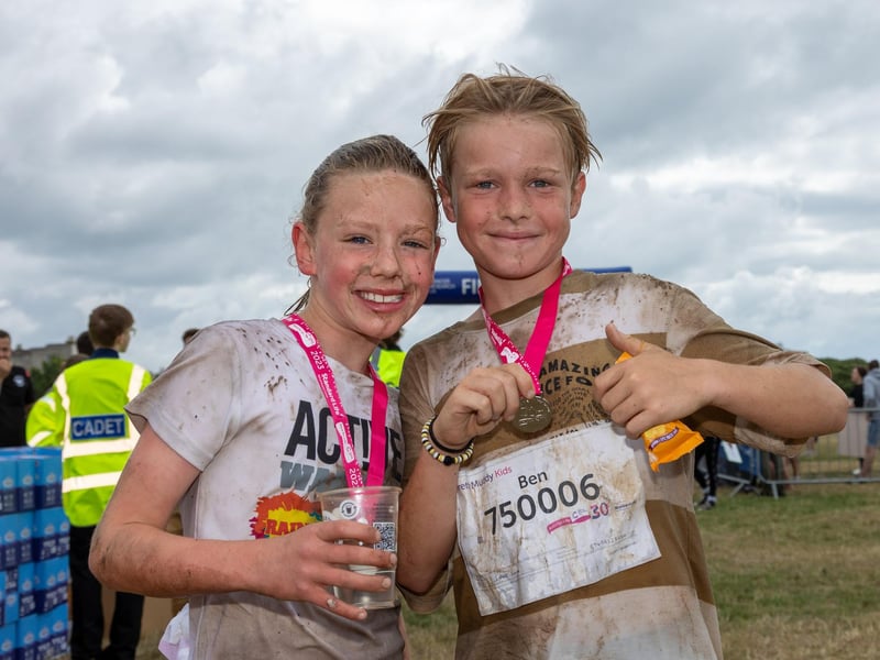 Race for Life Pretty Muddy took place on Saturday morning on Southsea Common as children and adults took on the obstacle course race.
Pictured - 1st and 2nd kids finishers Ben Smith, 10 and Maddie Draper, 8.
Photos by Alex Shute