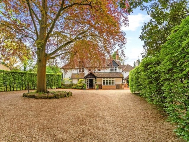 This spacious property comes with six bedrooms, four bathrooms and seven reception rooms.