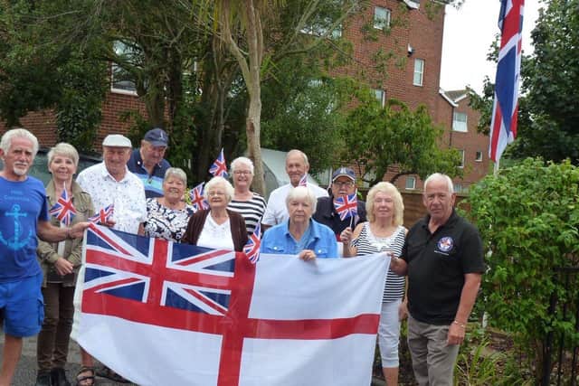 Joe Ince, 76, (far left) and many of his fellow veterans are elated they will now get the chance to vote on the flying of the White Ensign.