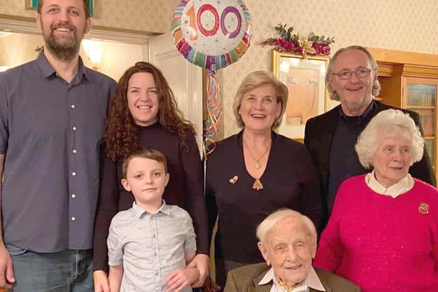 Basil, with his wife Sadie in red sweater, celebrating his 100th birthday with his family in Cambridge.