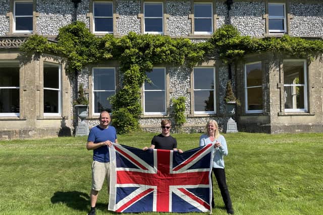 Flying the flag: Rachael Ross, her son Max, 17, and husband Ken. Rachael and Ken have been named as Platinum Champions, celebrating Britain's best volunteers, while Max has been named as a baton carrier ahead of the Commonwealth Games.