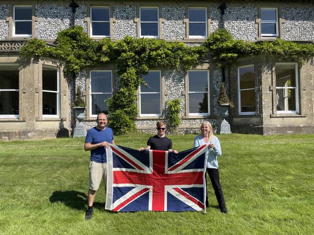 Flying the flag: Rachael Ross, her son Max, 17, and husband Ken. Rachael and Ken have been named as Platinum Champions, celebrating Britain's best volunteers, while Max has been named as a baton carrier ahead of the Commonwealth Games.
