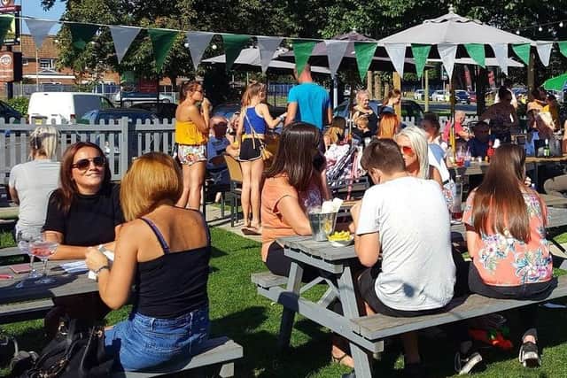The Heron, in Havant, with customers enjoying its garden before the Covid-19 pandemic. Picture: Craig Cockram