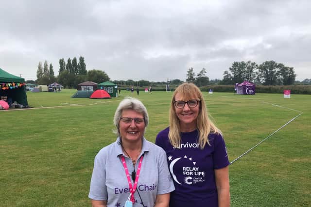 Portsmouth Relay For Life events chairwoman Jayne Bowater and cancer survivor Angela Newnham. Picture: Richard Lemmer