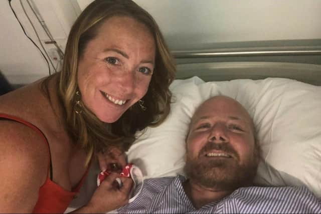 Simon Cooper, who was paralysed after an accident in a Gosport garden, was told he would spend a minimum of three months in Southampton General, but he is already being moved to Salisbury after six weeks and three days. Pictured with his wife Leanne
