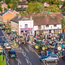 Crowds gathered in Wickham Square to watch the procession of tractors go by all to raise money for Rowans Hospice and Guide Dogs.