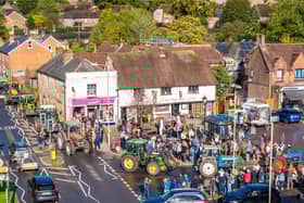 Crowds gathered in Wickham Square to watch the procession of tractors go by all to raise money for Rowans Hospice and Guide Dogs.