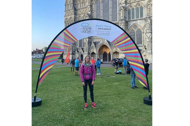 Sarah at the finish line outside Salisbury Cathedral.