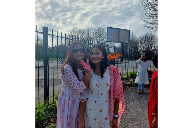 Suman and Pooja Ghosh celebrate at the Festival of Colours. Around 200 people attended the event as the Hindu community came together and welcomed anyone that wished to join them.